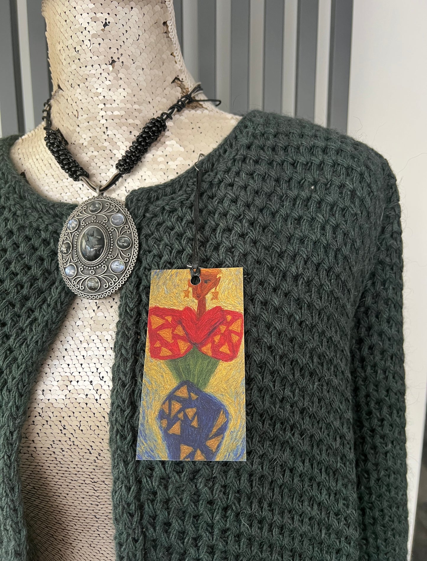 Dark green wool knitted cardigan