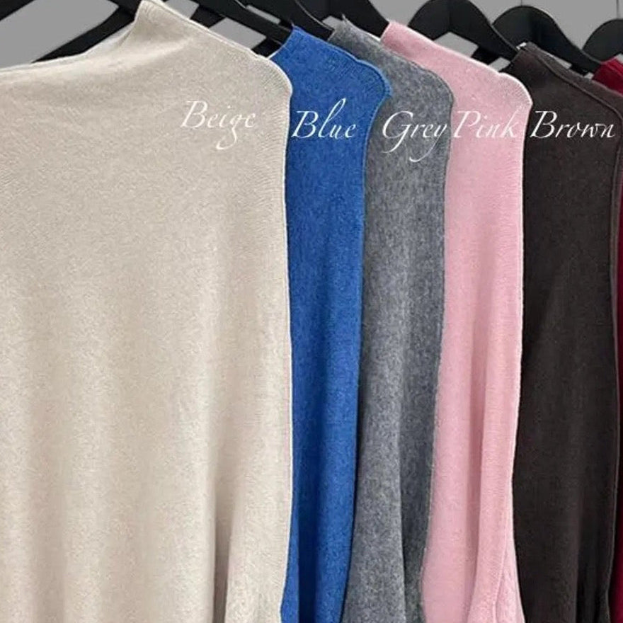 Asymmetric soft knit jumper