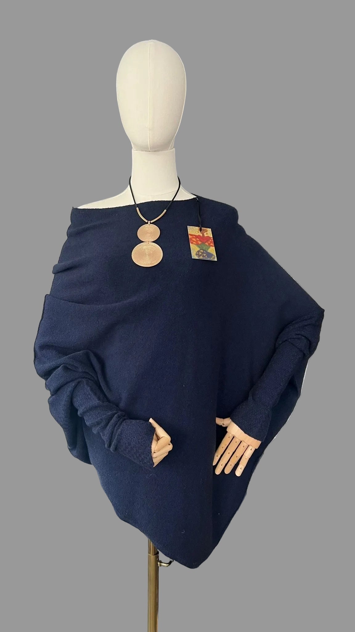 Navy asymmetrical jumper with batwing sleeves