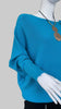 Turquoise jumper with elegant pearl detailing on the back