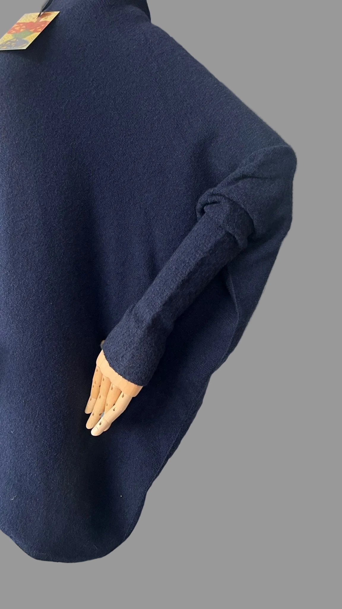 Navy asymmetrical jumper with batwing sleeves