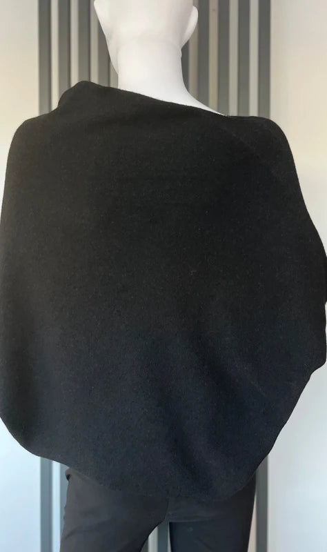 Black asymmetrical jumper with batwing sleeves