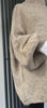Oversized beige high neck sweater