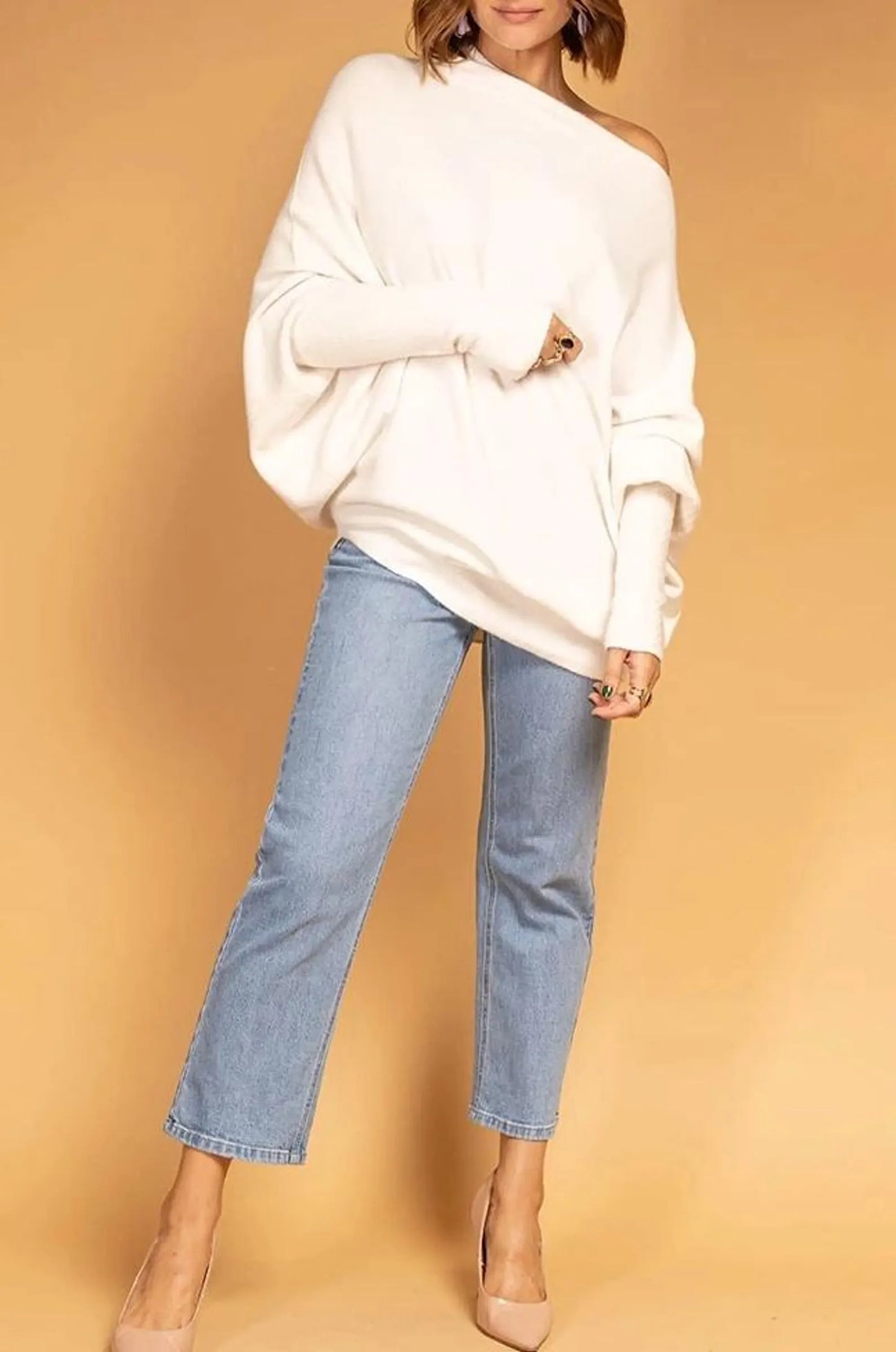 Off white asymmetrical batwing sleeve jumper