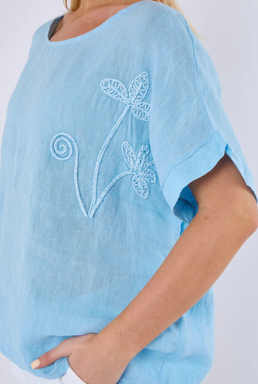 Light blue embroidered floral linen top