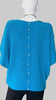 Turquoise jumper with elegant pearl detailing on the back